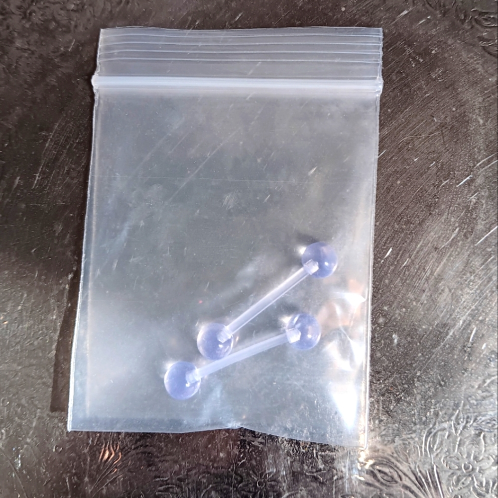 New 2 clear tongue rings